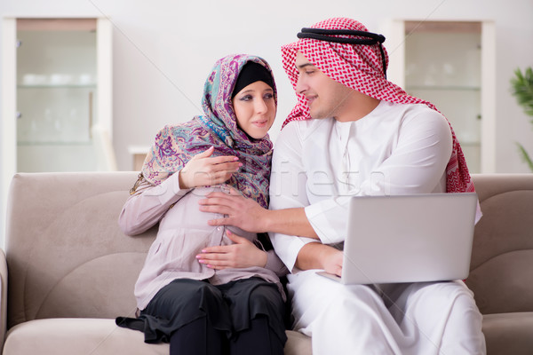 The young arab muslim family with pregnant wife expecting baby Stock photo © Elnur