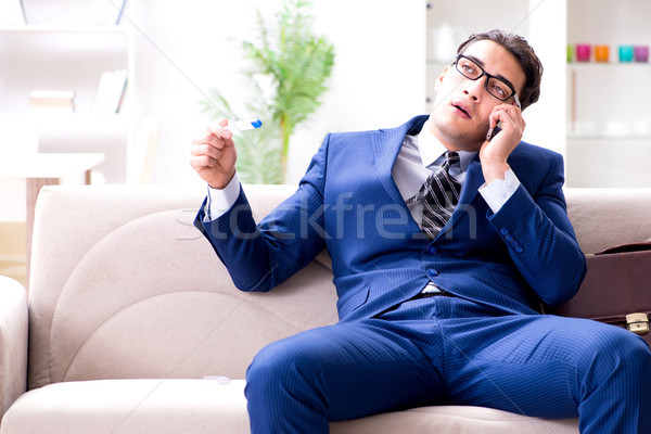 Sick employee staying at home suffering from flue Stock photo © Elnur
