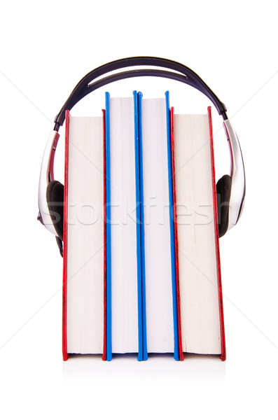 Concept of audio books with earphones on white Stock photo © Elnur