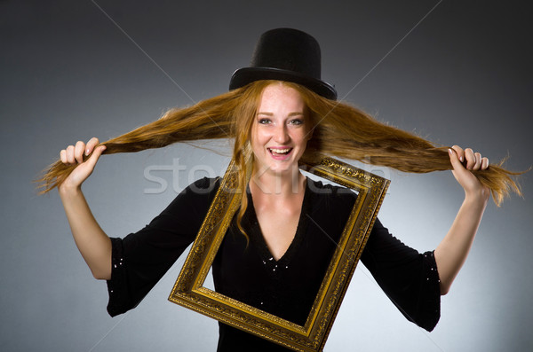 Woman with vintage hat and picture frame Stock photo © Elnur