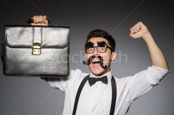 [[stock_photo]]: Jeune · homme · faux · moustache · cas · isolé