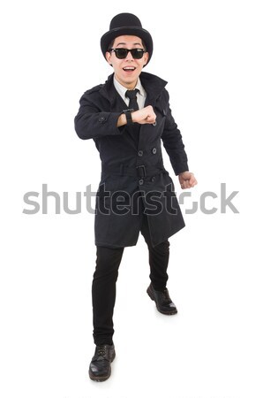 Stock photo: Young detective in black coat isolated on white