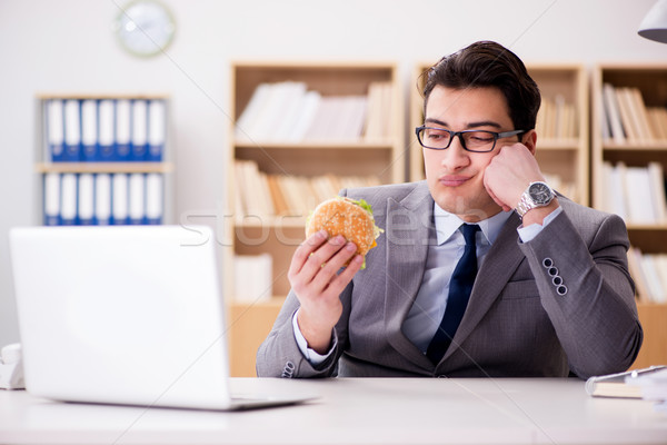 éhes vicces üzletember eszik egészségtelen étel szendvics Stock fotó © Elnur