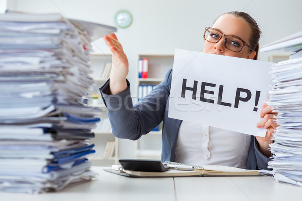 Businesswoman pleading for help in office Stock photo © Elnur