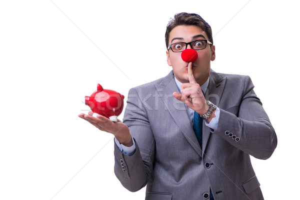 Funny clown businessman with a piggy bank isolated on white back Stock photo © Elnur