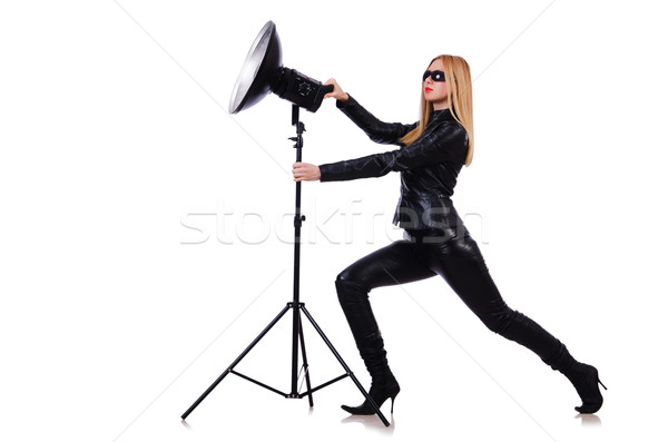 Woman in studio shoot-out Stock photo © Elnur