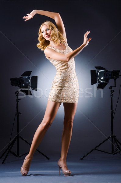 Young attractive woman in photo studio Stock photo © Elnur