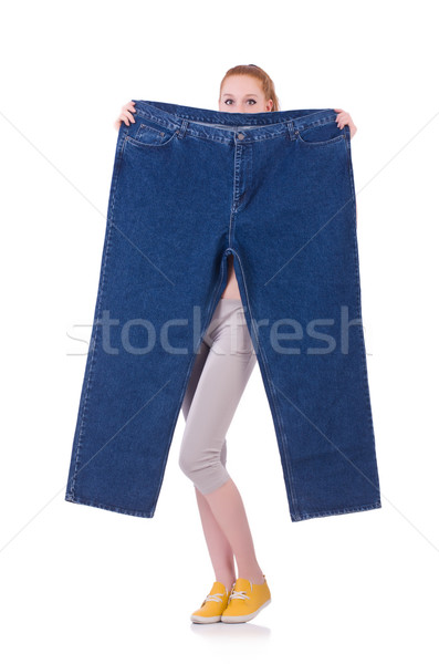 Woman with large jeans in dieting concept Stock photo © Elnur