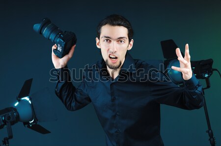 Funny businessman with gun on white Stock photo © Elnur
