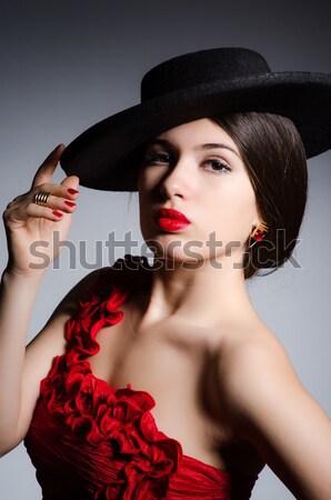 Atrakcyjna dziewczyna czerwona sukienka sexy dance moda czerwony Zdjęcia stock © Elnur