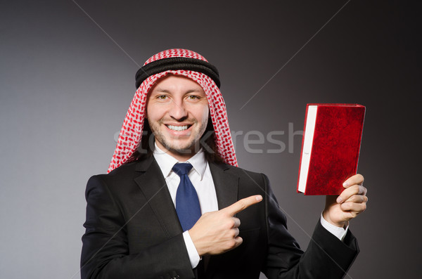 Arab man with book in diversity concept Stock photo © Elnur