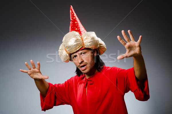 Funny wizard wearing red dress Stock photo © Elnur