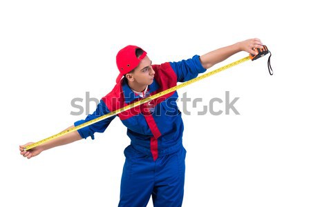 Young repairman with tape measure isolated on white Stock photo © Elnur
