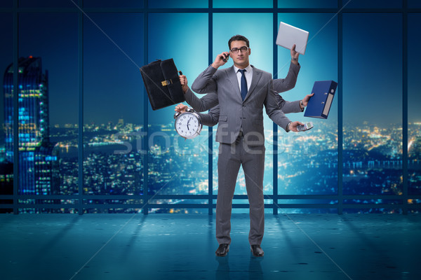 Giovani imprenditore multitasking business computer uomo Foto d'archivio © Elnur