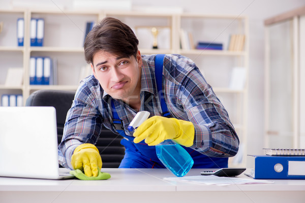 Male cleaner working in the office Stock photo © Elnur
