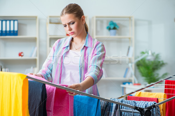 Foto stock: Cansado · deprimido · dona · de · casa · lavanderia · mulher · feliz