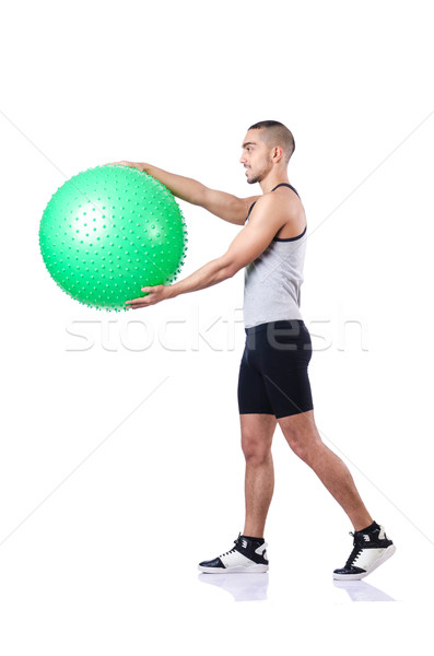 Man with swiss ball doing exercises on white Stock photo © Elnur