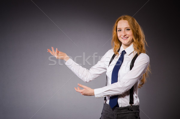 Pretty red hair girl in classic shirt against gray Stock photo © Elnur