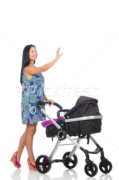 Happy mom with her baby in pram  Stock photo © Elnur