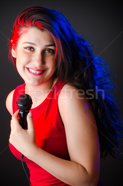 Mulher cantando karaoke clube festa cabelo Foto stock © Elnur