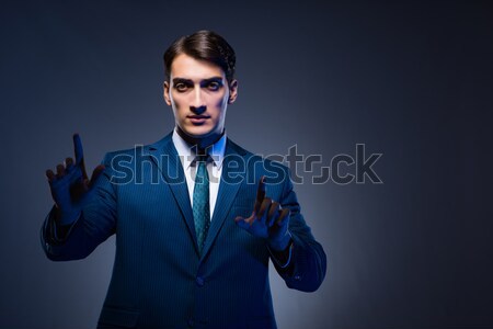 Businessman tied up with rope Stock photo © Elnur