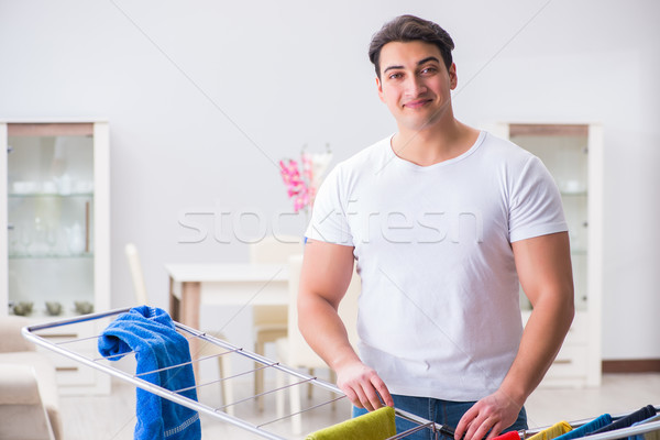 Man doing laundry at home Stock photo © Elnur