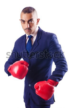 Stock photo: Badly beaten businessman with boxing gloves