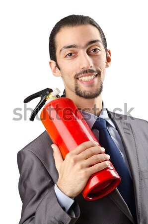 Stock photo: Young businessman holding dynamite isolated on white