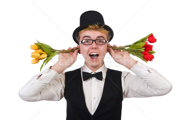 Smiling gentleman with flowers isolated on white Stock photo © Elnur
