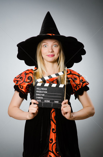 Witch with the movie clapboard  Stock photo © Elnur
