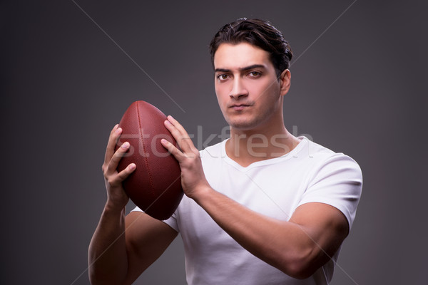 Man with american football in sports concept Stock photo © Elnur