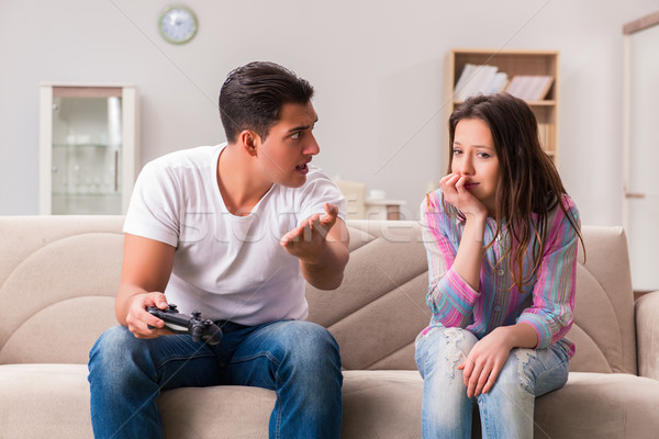 Young family suffering from computer games addiction Stock photo © Elnur