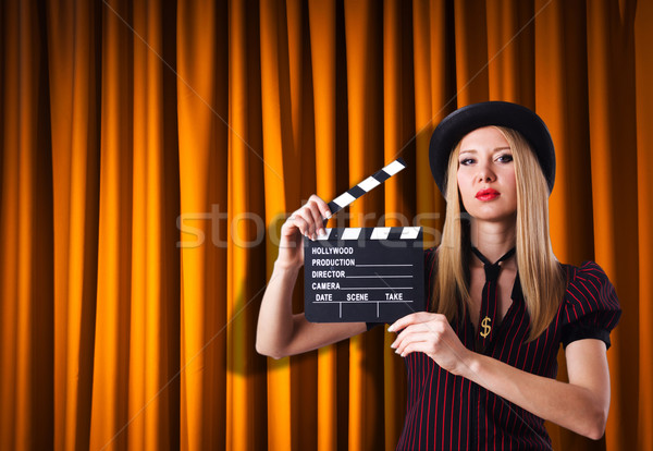 Woman gangster with movie clapper Stock photo © Elnur