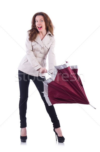 Stock photo: Woman with umbrella isolated on white