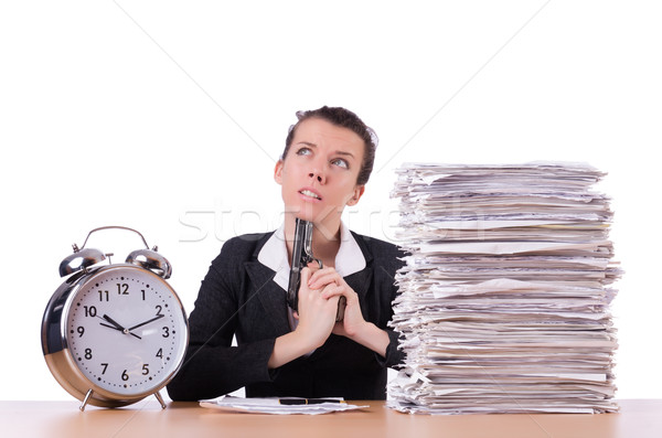 Woman with gun under stress from deadlines Stock photo © Elnur