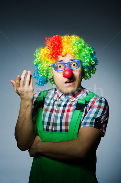 Funny clown against the dark background Stock photo © Elnur