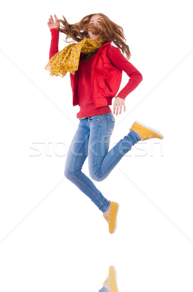 Cute smiling girl in red jacket and jeans isolated on white Stock photo © Elnur