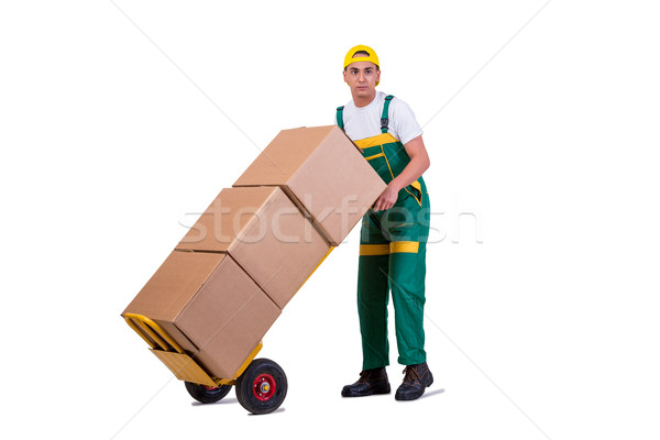 Stock photo: Young man moving boxes with cart isolated on white