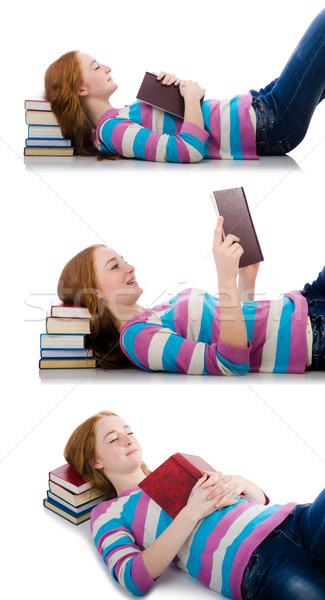 Stock photo: The young student with books isolated on white