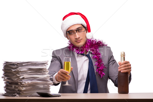 Young businessman celebrating christmas in office Stock photo © Elnur