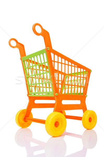 Plastic shopping cart against the white background Stock photo © Elnur