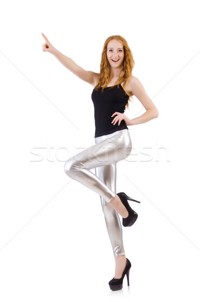 Stock photo: Young redhead girl in tight leggings