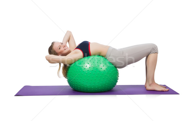 Woman exercising with swiss ball on white Stock photo © Elnur