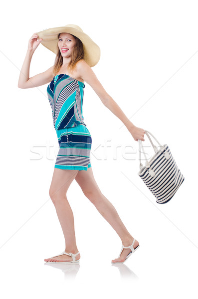 Stock photo: Pretty woman with summer handbag and panama isolated on white