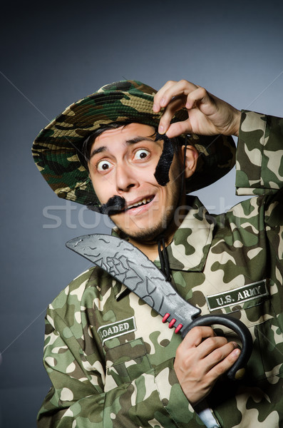 Amuzant soldat întuneric om verde război Imagine de stoc © Elnur