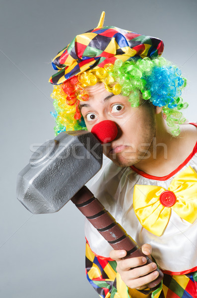 Clown with hammer in funny concept Stock photo © Elnur