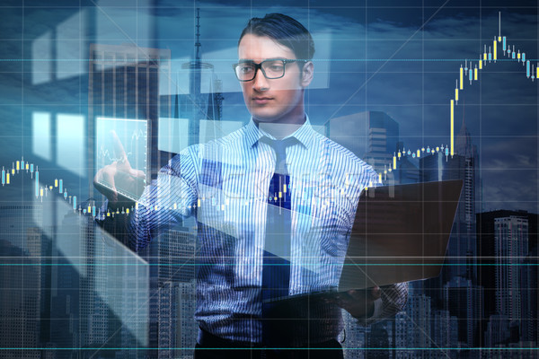 Young businessman in online trading concept Stock photo © Elnur