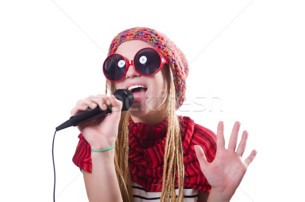 Young female singer with mic on white Stock photo © Elnur