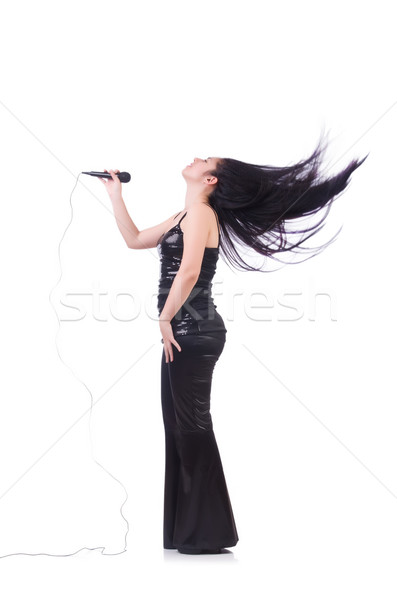 Young female singer with mic on white Stock photo © Elnur