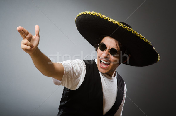 Person wearing sombrero hat in funny concept Stock photo © Elnur